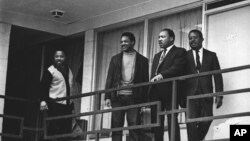 FILE - In this Apr. 3, 1968 file photo, the Rev. Martin Luther King Jr. stands with other civil rights leaders on the balcony of the Lorraine Motel in Memphis, Tenn., a day before he was assassinated at approximately the same place. From left are Hosea Williams, Jesse Jackson, King, and Ralph Abernathy. 
