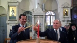 Ruski predsednik Vladimir Putin i sirijski predsednik Bašar al-Asad tokom posete pravoslavnoj crkvi u Damasku, 7. januara 2019. s, Syria January 7, 2020.
