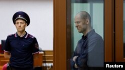 Wall Street Journal reporter Evan Gershkovich, who is accused of spying by Russia, is seen before a court hearing in Yekaterinburg, Russia June 26, 2024.