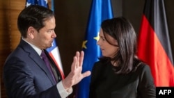 U.S. Secretary of State Marco Rubio and German Foreign Minister Annalena Baerbock speak during the Munich Security Conference in Munich on Feb. 15, 2025. The United States and Germany are among G7 members who agreed to keep working for a strong peace deal for Ukraine.