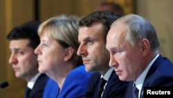Володимир Зеленський, Анґела Меркель, Еммануель Макрон та Володимир Путін на зустрічі у Парижі 9 грудня 2019 р.