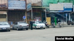 Iranian special police forces patrol the empty streets of Baneh, May 4, 2018, as residents continue a general strike they began on April 15 to protest Tehran's blockade of border footpaths they rely on to import goods to sell.