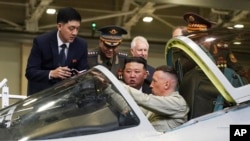 FILE - North Korea's Kim Jong Un looks inside a jet cockpit at a Russian plant that builds fighter jets in Komsomolsk-on-Amur, Russia, Sept. 15, 2023. Analysts see the growing Pyongyang-Moscow partnership giving Kim less reason to engage with U.S. leaders.