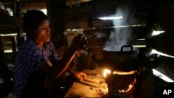 (File Photo) A villager cooks dinner on a cook stove in Koh Kong province, west of Phnom Penh, Cambodia.