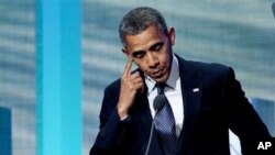  Clinton Global Initiative ဆွေးနွေးပွဲမှာ မိန့်ခွန်းပြောကြားနေသည့် သမ္မတအိုဘားမား။ (၀၉၊ ၂၅၊ ၂၀၁၂။) 