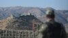 FILE - A Pakistani army soldier stands guard at a border post in Ghulam Khan, North Waziristan, on the border between Pakistan and Afghanistan, Jan. 27, 2019.