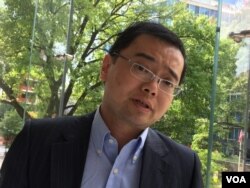 上海国际问题研究院薛晨博士（美国之音燕青拍摄）