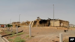 Na ovoj fotografiji koju je objavila Organizacija za atomsku energiju Irana, vidi se zgrada nakon što je oštećena u požaru, u postrojenju za obogaćivanje uranijuma u Natanzu, oko 322 kilometra od glavnog grada Teherana, Iran