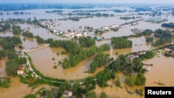 An aerial view shows a flooded town in China's Anhui province, July 20, 2020. (China Daily via Reuters) 