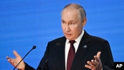  Vladimir Putin, arhivska fotografija (Grigory Sysoyev, Sputnik, Kremlin Pool Photo via AP)