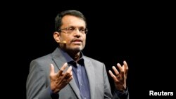 FILE - Ravi Menon, managing director of the Monetary Authority of Singapore (MAS), speaks at the Singapore Fintech Festival in Singapore Nov. 16, 2016.