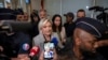 France's Le Pen denies wrongdoing as she and her party go on trial accused of embezzling EU funds 