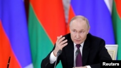 Russia's President Putin and Belarus' President Lukashenko meet in Moscow