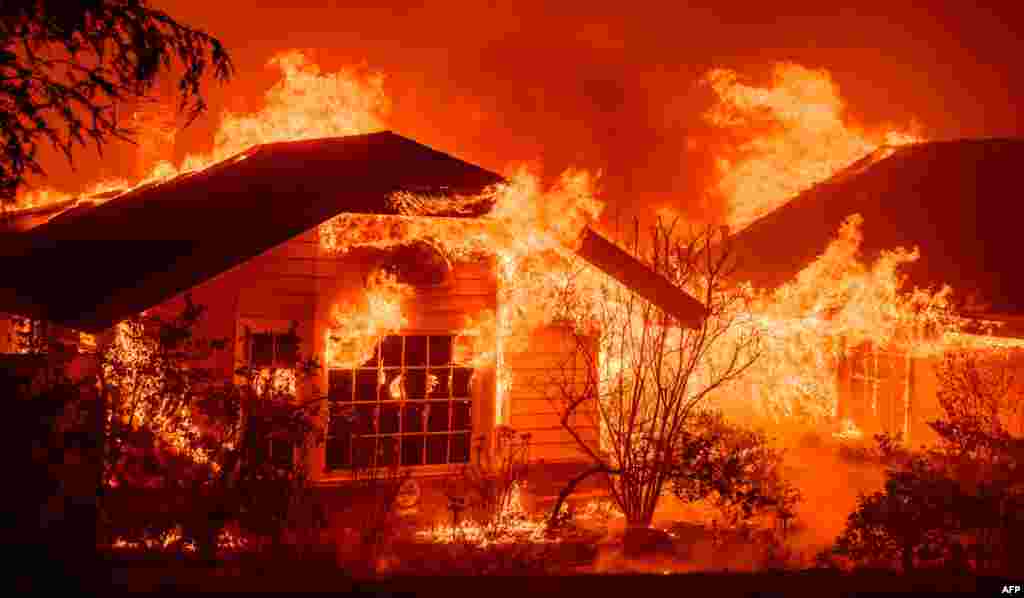 A home burns during the Eaton Fire in the Altadena area of Los Angeles County, California, Jan. 8, 2025.