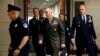 Joint Chiefs Chairman Gen. Joseph Dunford, center, walks to a classified briefing for members of the U.S. Senate on Iran, on Capitol Hill in Washington, May 21, 2019. 