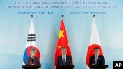中日韩三国曾在2019年8月举行外长会议。（美联社）