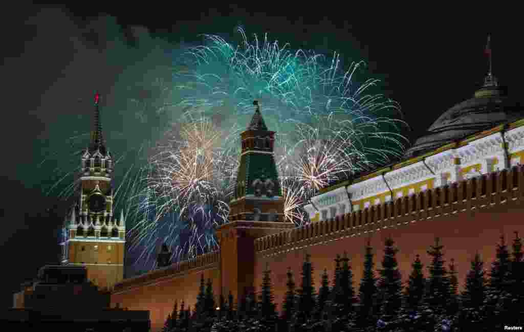 Fireworks explode in the sky during New Year celebrations in Moscow's Red Square, Russia, Jan. 1, 2019.