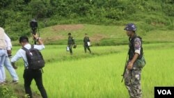 FILE- Major General Aung Ye Win, Director of Military Information Department talks to the journalists in Maungdaw, Rakhine state, Myanmar, Sept. 27, 2017.