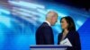 FILE - Democratic presidential candidate former Vice President Joe Biden, left, and then-candidate Sen. Kamala Harris, D-Calif. shake hands after a Democratic presidential primary debate.