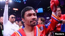 Manny Pacquiao saat laga dengan Keith Thurman untuk memperebutkan gelar juara kelas welter WBA di MGM Grand Garden Arena, Las Vegas, 20 Juli 2019. (Foto: Joe Camporeale-USA TODAY Sports via Reuters)