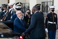 U.S. Defense Secretary Lloyd Austin welcomes Ukrainian Defense Minister Oleksiy Reznikov, during a ceremony at the Pentagon, in Arlington, Virginia, Nov. 18, 2021.