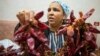 Chili paste heats up dishes and warms hearts at northeastern Tunisia's harissa festival
