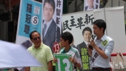 港岛区民主党候选人许志峰投票日在西营盘正街拉票