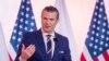 US Defence Secretary Pete Hegseth speaks during join press conference with Poland's Defence Minister after their meeting at the Ministry of Defence headquarters in Warsaw on February 14, 2025. (Photo by Wojtek RADWANSKI / AFP)