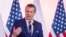 US Defence Secretary Pete Hegseth speaks during join press conference with Poland's Defence Minister after their meeting at the Ministry of Defence headquarters in Warsaw on February 14, 2025. (Photo by Wojtek RADWANSKI / AFP)