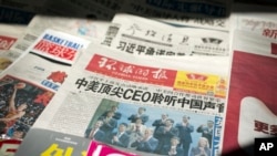 北京街头摊上的环球时报等中国报纸(资料图片)