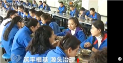 Screenshot from a CCTV report on "vocational training facility" in Xinjiang.