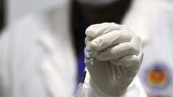 A nurse prepares a dose of China’s Sinopharm vaccine during a priority COVID-19 vaccination of Cambodian high ranking officials in Phnom Penh, Cambodia, February 10, 2021. (Hean Socheata/VOA Khmer)