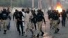 Pakistani police fired tear gas, charge protesters in Karachi