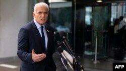 Israel's opposition leader and former prime minister Yair Lapid delivers a statement to the press following his meeting with U.S. Secretary of State Antony Blinken at the State Department in Washington, Sept. 16, 2024.