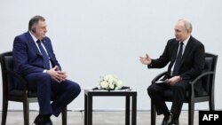 Susret Dodika i Putina u Kazanju, 21. februar 2024. (Photo by Sergei BOBYLYOV/ POOL/AFP)