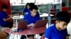 Students work on creating a website during a class at the Liger Learning Center, a school in Phnom Penh that emphasizes courses in science, technology, engineering and mathematics. (Dene-Hern Chen for VOA News)