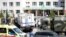 ARCHIVES - Une ambulance et des camions de police dans une école où une fusillade a eu lieu à Kazan, en Russie, mardi 11 mai 2021. 