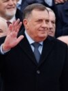 Bosnia's member of tripartite presidency Milorad Dodik waves to people during parade celebrations to mark their autonomous Serb Republic's national holiday, in Banja Luka