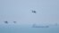 Chinese military helicopters fly past Pingtan Island on August 4, 2022, ahead of massive military drills off Taiwan. Pingtan Island is part of Fujian Province and one of China's closest points to Taiwan. (Hector Retamal/AFP