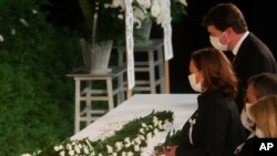 U.S. Vice President Kamala Harris lays flowers during the state funeral for former Prime Minister Shinzo Abe, Sept. 27, 2022, in Tokyo. Abe was assassinated in July.