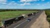 A drone view shows stranded trucks at the side of the road, near the Lebombo border outside Mbombela, South Africa, Nov. 29, 2024. Mozambique’s political instability has caused traffic congestion and delays at its borders, affecting trade. 
