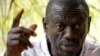 FILE - Opposition leader Kizza Besigye speaks during a news conference at his home at the outskirts of Kampala, Uganda, Feb. 21, 2016.