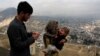 FILE - A child receives polio vaccination drops during an anti-polio campaign in Kabul, Afghanistan.