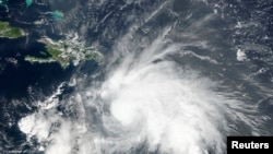 Badai tropis Matthew, terlihat di satelit NASA-NOAA, Suomi NPP pada 29 September 2016. 