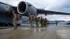 FILE - U.S. Army Soldiers board a U.S. Air Force C-17 Globemaster III as part of a force projection exercise at Joint Base Elmendorf-Richardson, Alaska, Sept. 13, 2024. 
