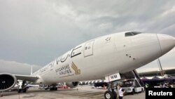 A Singapore airline aircraft is seen on tarmac after requesting an emergency landing at Bangkok's Suvarnabhumi International airport, Thailand