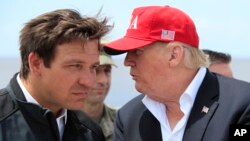 Guverner Floride Ron Desantis i bivši predsednik SAD Donald Tramp, arhiva