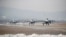FILE - U.S. Air Force F-16 fighter jets take part in a joint aerial drills called Vigilant Ace between U.S and South Korea, at the Osan Air Base in Pyeongtaek, South Korea, Dec. 6, 2017.