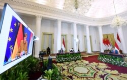 Suasana pertemuan virtual antara Presiden Joko Widodo dan Kanselir Jerman Angela Merkel, di Istana Bogor, Selasa, 13 April 2021. (Foto: Setneg)