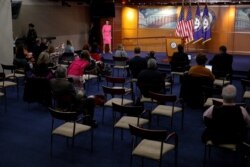 U.S. Speaker of the House Nancy Pelosi (D-CA) walks to the podium at the start of a news conference, following a Senate vote on the coronavirus relief bill on Capitol Hill in Washington, March 26, 2020.